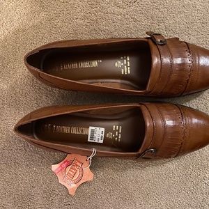 New brown leather size 12 wide ladies flats.  Tags attached.